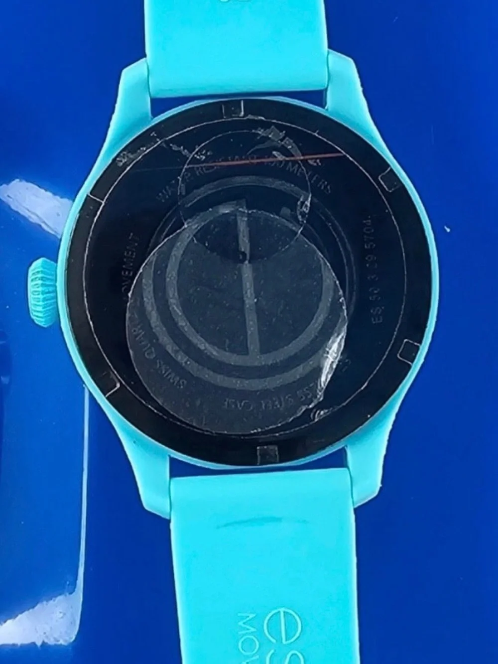 Movado ESQ Turquoise Silicone Ladies Watch with Orange Accent